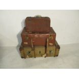 Two vintage trunks including one steamer trunk, along with one other