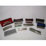 A collection of nine harmonicas including, Hohner Cromonica, Hohner Chromatic Harmonica, Hohner