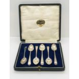 A cased set of hallmarked silver coffee spoons - one A/F