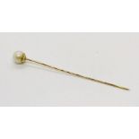 A continental gold (probably 14ct) tie pin set with a pearl