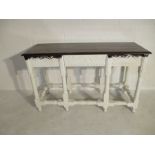 A painted oak buffet with single drawer along with additional rustic top