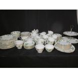 A comprehensive part Colclough ivy leaf and similar dinner set including tea cups, saucers,