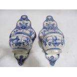 Two Dutch Delft blue and white wall pockets - both repaired