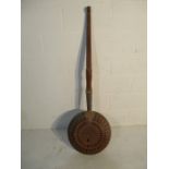 An oversized copper warming pan, 143 cm