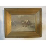 A turn of the century oil on board of a snowy town scene monogrammed HC, 17.5cm x 25cm