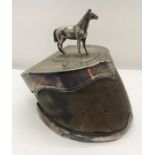 A silver plated snuff box formed from a horses hoof