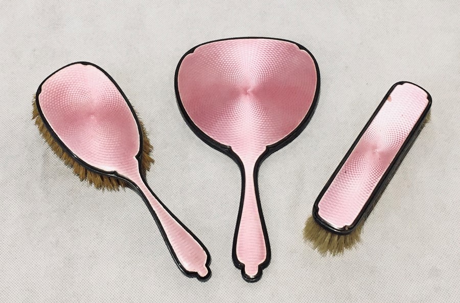 A pink guilloche enamel hallmarked silver part dressing set consisting of a mirror and two brushes, - Image 2 of 12