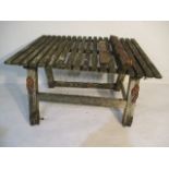 A wooden garden table with cast iron lifting handles - table A/F