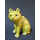 A 19th Century Chinese pottery cat with character mark to underside of foot, height 16.5cm