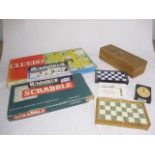 A collection of vintage games and cards including Cluedo, dominoes etc