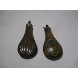 Two antique copper powder flasks