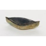 An Edwardian hallmarked silver pincushion in the form of a canoe