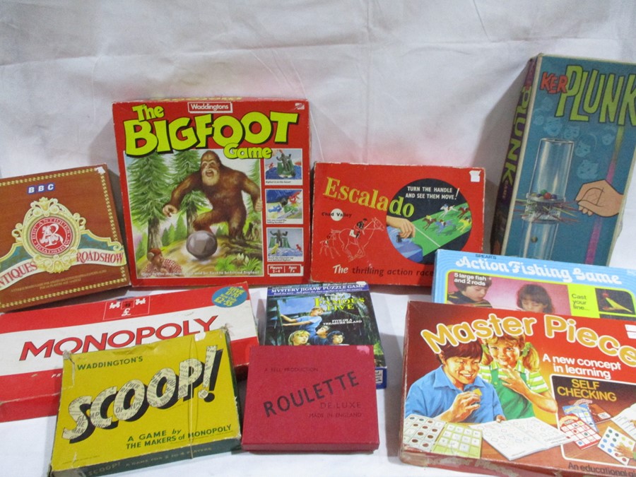 A collection of vintage games including Escalado, Ker-Plunk, The Bigfoot Game etc.