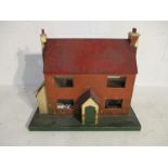 A 1930's doll's house and various furniture etc