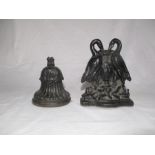 Two Victorian doorstops, one in the form of a bell (height 14cm), the others with storks (height