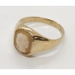 A 9ct gold ring set with a cameo