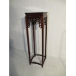 A Chinese hardwood plant stand H122cm