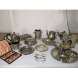 A collection of various silver plated items including a part tea service, trays, set of teaspoons