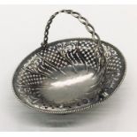 A hallmarked silver basket with pierced decoration, weight 132.4g