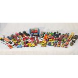 A collection of die cast and toy cars