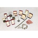 A collection of silver and other jewellery including a silver charm bracelet etc.