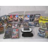 Two PSP handheld games consoles along with a selection of games, films, Sega Mega Drive camera etc
