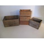 A collection of five vintage wooden crates, including one stamp marked J.C. &.R.J. Palmer, Old