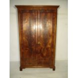 A Victorian mahogany wardrobe with one drawer under