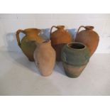 A collection of five pieces of terracotta including pots, jugs etc