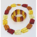 An amber fleck necklace with matching bracelet