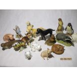 A collection of animal figures including Aynsley, Minton, Sylvac etc.