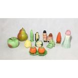 A collection of novelty salt and pepper shakers