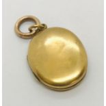 A 9ct rose gold locket