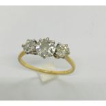 A diamond 3 stone ring set in 14ct (525) gold, approx 1ct total