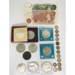 A collection of currency including a 1797 cartwheel penny and silver 3d's