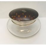 A hallmarked silver and tortoiseshell powder bowl with silver crest to lid, approx 16cm diameter