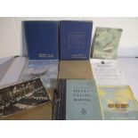 Five volumes of "Aircraft of the Fighting Powers" along with an RAF Pilots Flying manual etc.