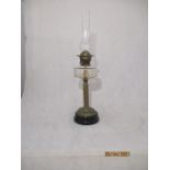 A Victorian clear glass oil lamp