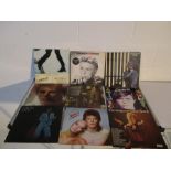 A collection of nine David Bowie 12" vinyl albums including Space Oddity (with poster), Ziggy