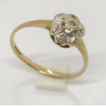 A 9ct gold "petal" ring set with diamonds