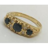 A 9ct gold diamond and sapphire Victorian style ring