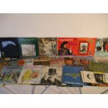 A collection of 12" & 7" vinyl records including classical, easy listening, War of the Worlds, The