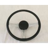 A Triumph Stag steering wheel