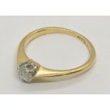 An 18ct gold diamond solitaire ring