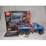 A completed Lego "Technic" all terrain tow truck (42070) with original box and instructions