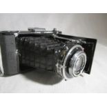 A vintage Zeiss Ikon Pronto Camera with original carry case.