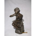 A large bronzed Art Nouveau style figure of a nude lady sitting on a rock, height 45.5 cm