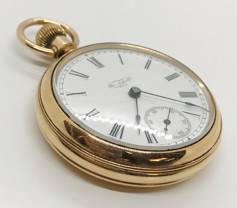 A gold plated pocket watch the white enamel dial with subsidiary dial, The Sales Co., USA