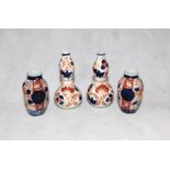 Two pairs of miniature Japanese Imari vases
