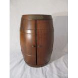 A wooden Glenmorangie Malt Store barrel with accessories